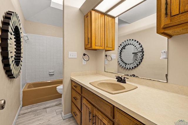 5 Amy Scott Ct, Longview, TX 75605 - bathroom featuring vanity, wood finished floors, and shower / bath combination