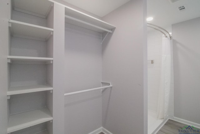 2104 Mccann Rd, Longview, TX 75601 - spacious closet featuring wood finished floors