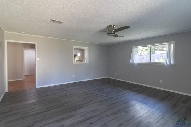 2104 Mccann Rd, Longview, TX 75601 - empty room with a textured ceiling, ceiling fan, and dark wood finished floors