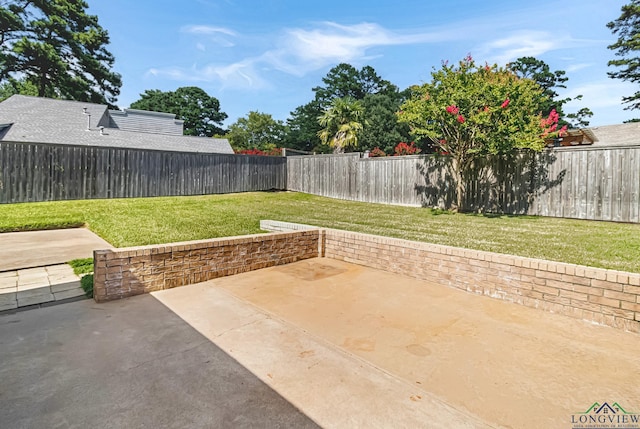 2104 Mccann Rd, Longview, TX 75601 - fenced backyard featuring a patio area
