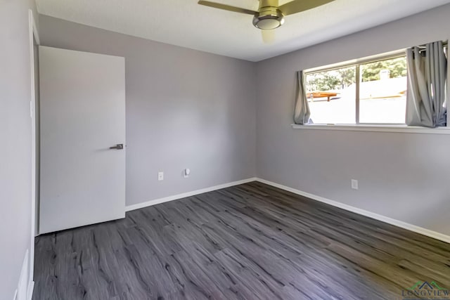 2104 Mccann Rd, Longview, TX 75601 - empty room with dark wood-style floors and ceiling fan