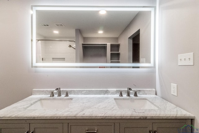 2104 Mccann Rd, Longview, TX 75601 - bathroom with double vanity and a shower
