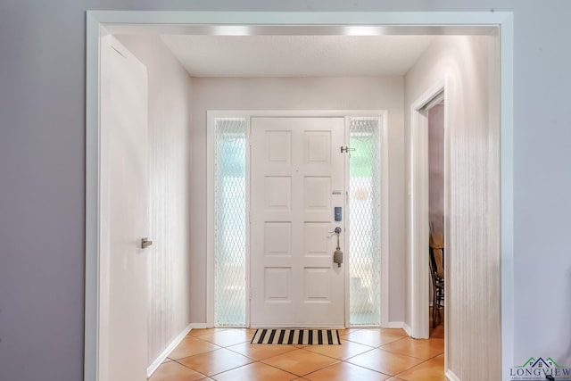 2104 Mccann Rd, Longview, TX 75601 - entrance foyer featuring light tile patterned flooring and healthy amount of natural light