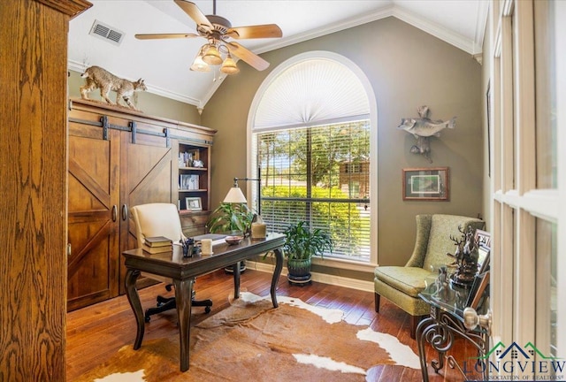 909 University Dr, Carthage, TX 75633 - office featuring vaulted ceiling, hardwood / wood-style floors, ceiling fan, and crown molding