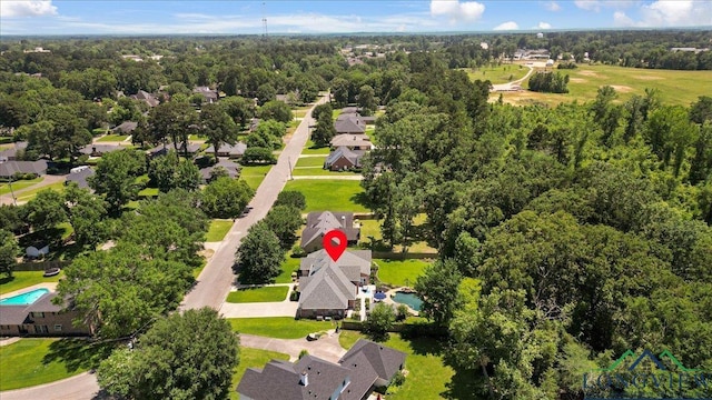 909 University Dr, Carthage, TX 75633 - aerial view of residential area featuring a pool