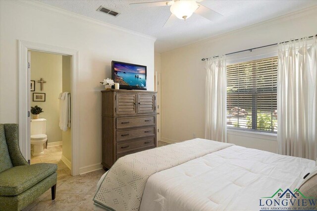 909 University Dr, Carthage, TX 75633 - bedroom featuring ornamental molding, ensuite bathroom, light tile patterned flooring, a ceiling fan, and baseboards