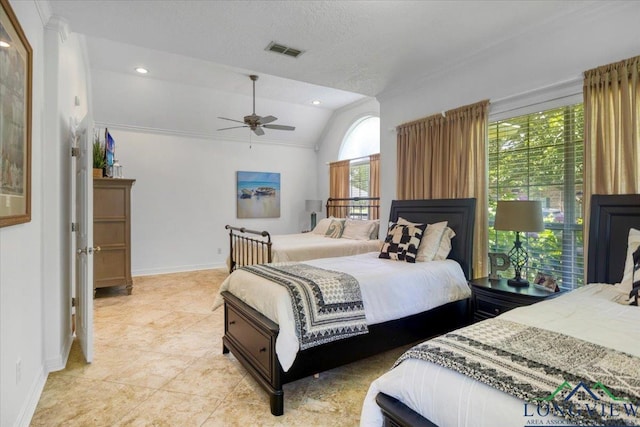 909 University Dr, Carthage, TX 75633 - bedroom featuring lofted ceiling, baseboards, light tile patterned floors, a ceiling fan, and recessed lighting