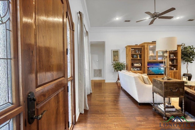 909 University Dr, Carthage, TX 75633 - living room with ornamental molding, dark wood-style floors, a ceiling fan, recessed lighting, and baseboards