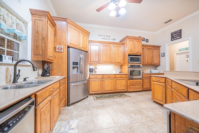 kitchen featuring decorative backsplash, stainless steel appliances, ornamental molding, and sink