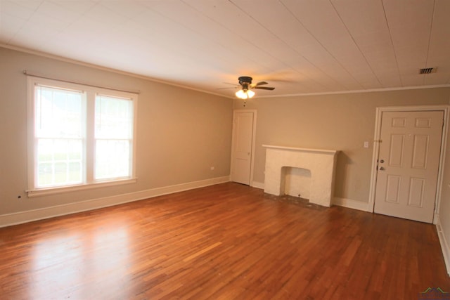 unfurnished living room featuring ornamental molding, ceiling fan, and dark hardwood / wood-style flooring