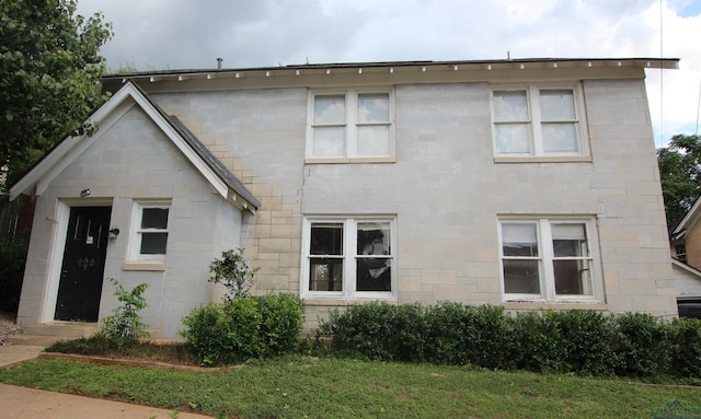 exterior space featuring a front lawn