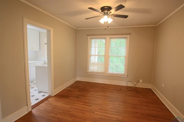 unfurnished room featuring crown molding, dark wood-type flooring, and ceiling fan