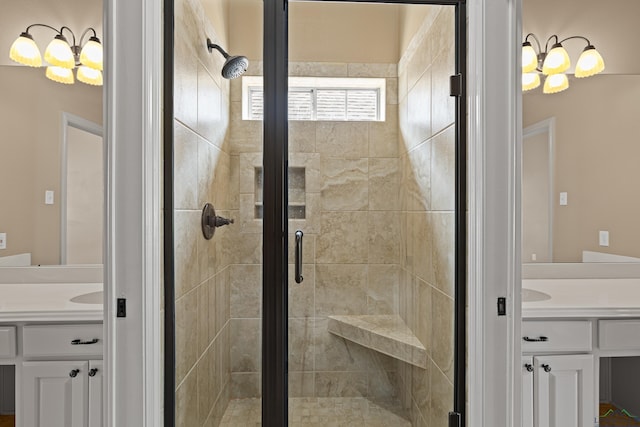 full bath with a shower stall and vanity