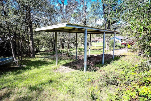 view of yard with a carport