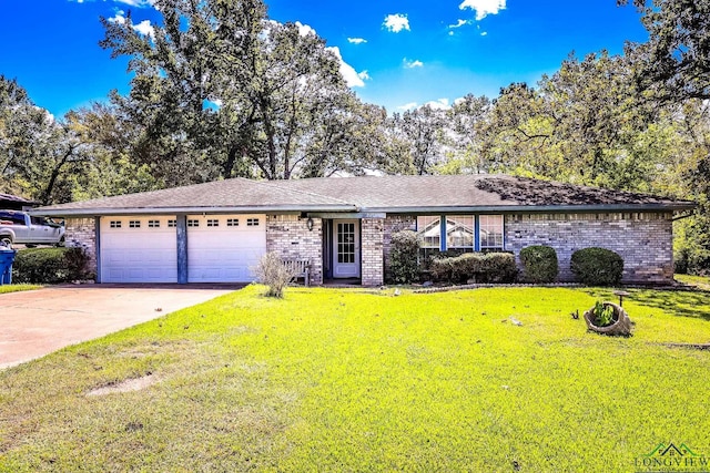 single story home featuring a garage and a front lawn