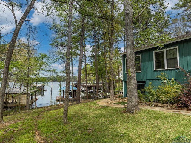 view of yard with a water view