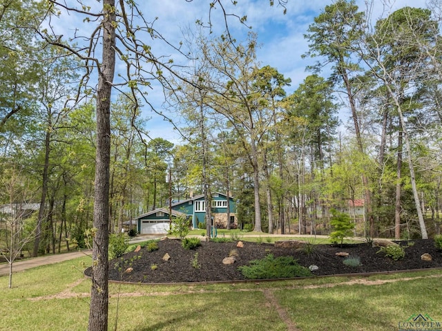 view of yard with a garage