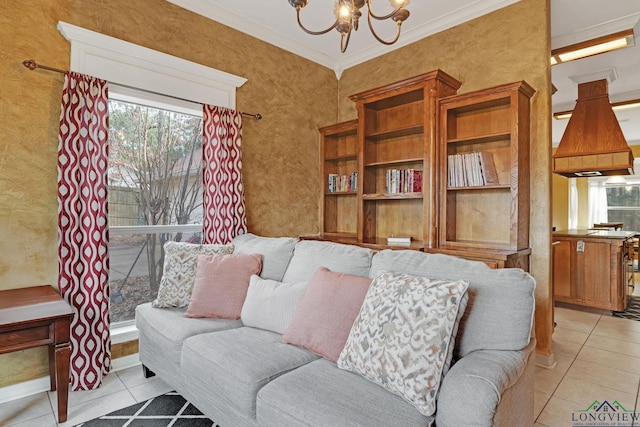 living room with light tile patterned floors, crown molding, and an inviting chandelier