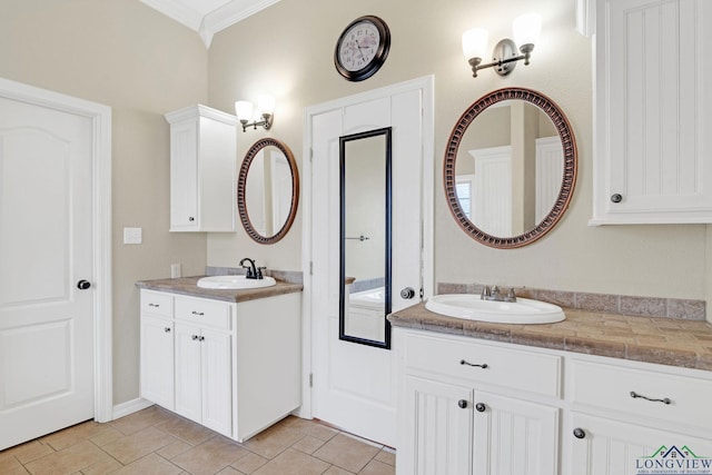 bathroom featuring vanity and crown molding