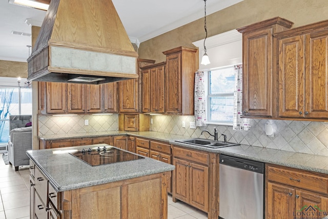 kitchen with stone countertops, custom range hood, stainless steel dishwasher, black electric cooktop, and a kitchen island