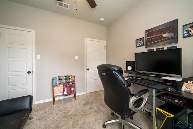 carpeted office space with ceiling fan