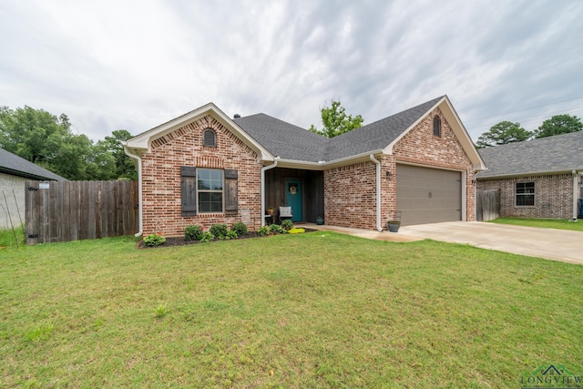 ranch-style house with a garage and a front lawn