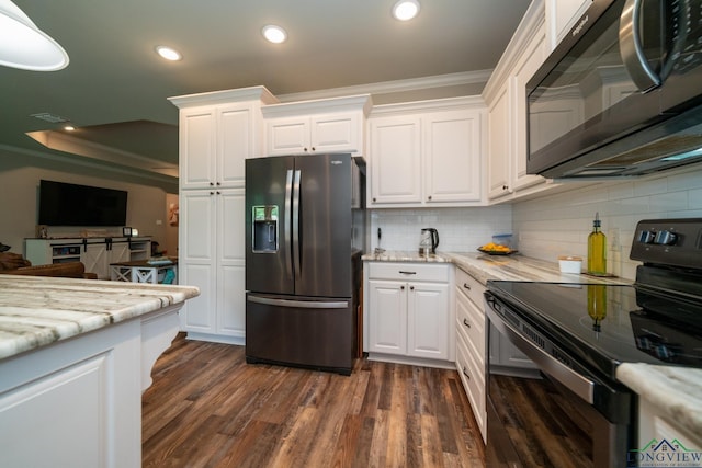 kitchen with stainless steel refrigerator with ice dispenser, white cabinets, dark wood-type flooring, and electric range