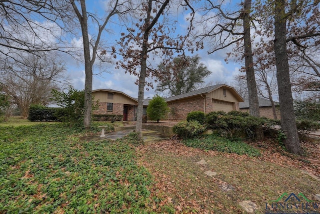 single story home featuring a garage