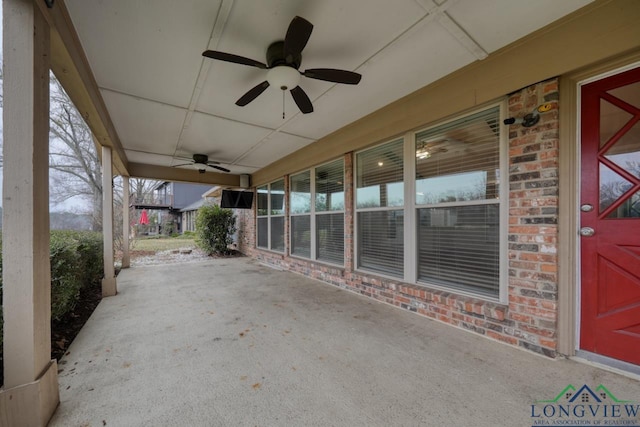 view of patio featuring ceiling fan