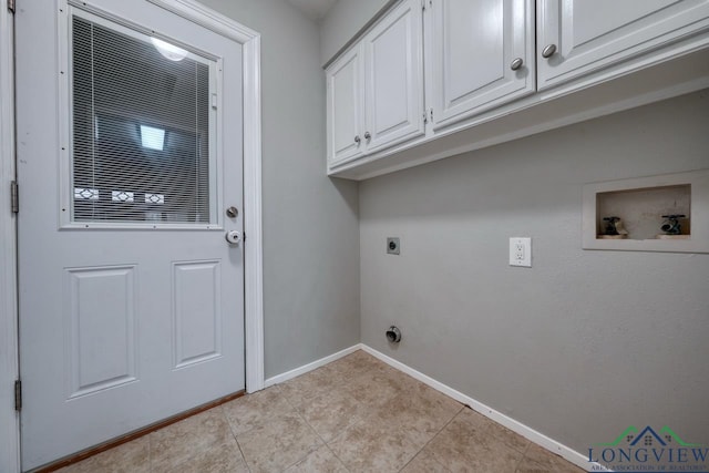 washroom featuring cabinets, washer hookup, hookup for an electric dryer, and light tile patterned flooring