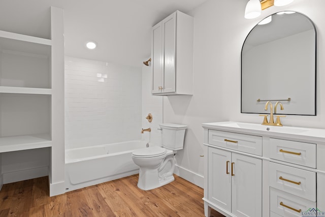 330 Forest Hls, Hallsville, TX 75650 - bathroom with vanity, wood finished floors, bathtub / shower combination, and recessed lighting