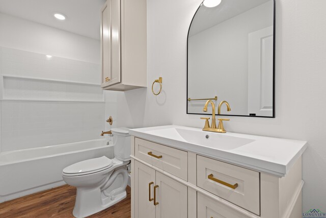 330 Forest Hls, Hallsville, TX 75650 - full bathroom featuring wood finished floors, vanity, and bathing tub / shower combination