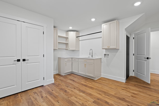 330 Forest Hls, Hallsville, TX 75650 - kitchen with open shelves, light wood-style flooring, white cabinetry, recessed lighting, and light countertops