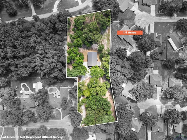 330 Forest Hls, Hallsville, TX 75650 - aerial view of residential area with property boundaries highlighted
