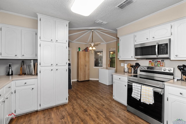 kitchen featuring white cabinets, ceiling fan, stainless steel appliances, and a textured ceiling