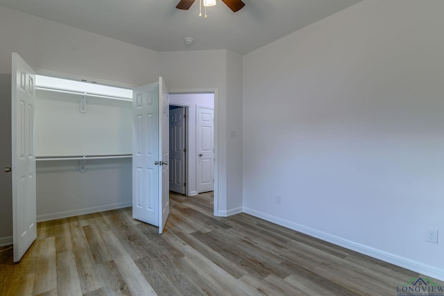 unfurnished bedroom featuring a closet, ceiling fan, and light hardwood / wood-style floors