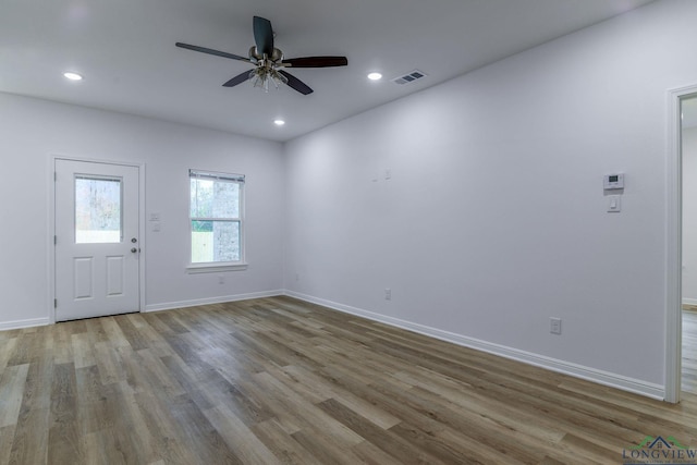 foyer featuring light hardwood / wood-style floors and ceiling fan