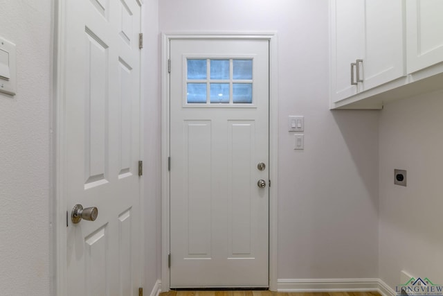 doorway to outside featuring light wood-type flooring