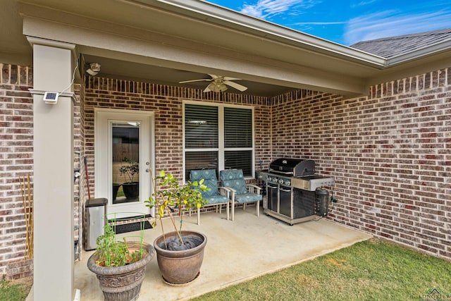 view of patio featuring grilling area and ceiling fan