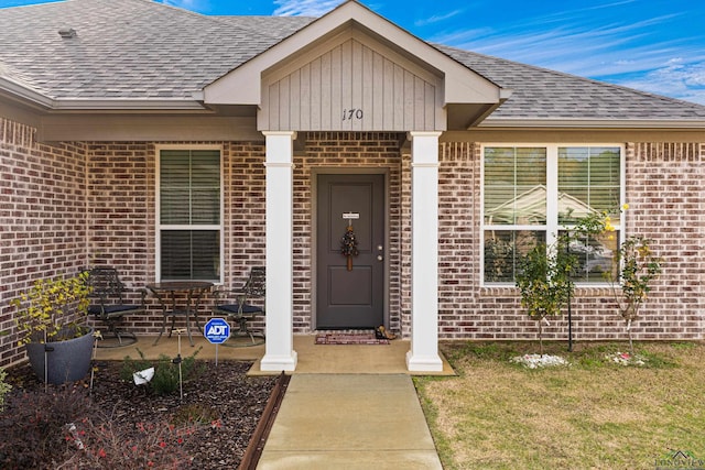 entrance to property with a porch