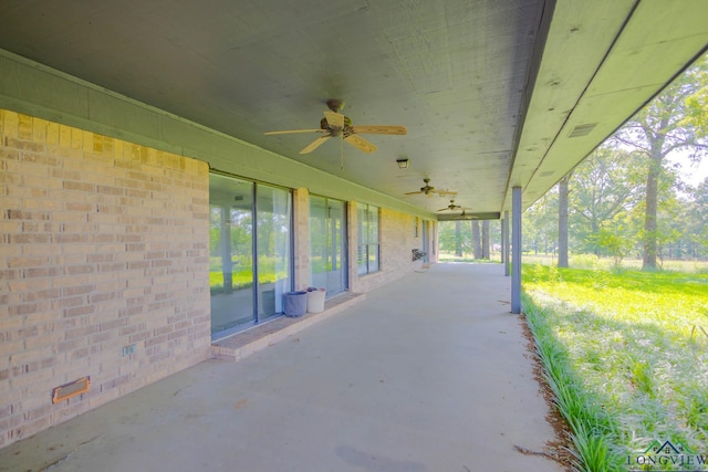 7876 Green Hills Rd, Gilmer, TX 75645 - view of patio / terrace with a ceiling fan