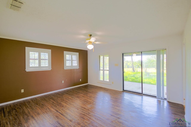 7876 Green Hills Rd, Gilmer, TX 75645 - empty room featuring ceiling fan, wood finished floors, ornamental molding, and baseboards