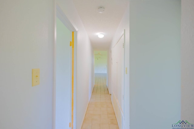 7876 Green Hills Rd, Gilmer, TX 75645 - hall with light tile patterned flooring