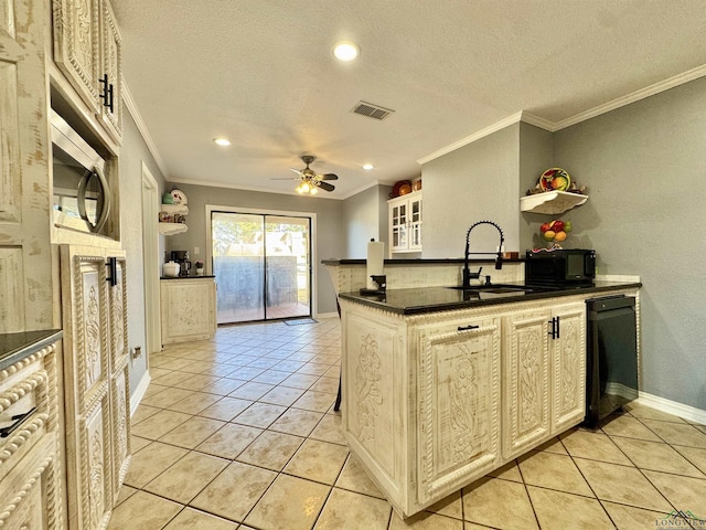 kitchen with sink, ceiling fan, black dishwasher, and a textured ceiling