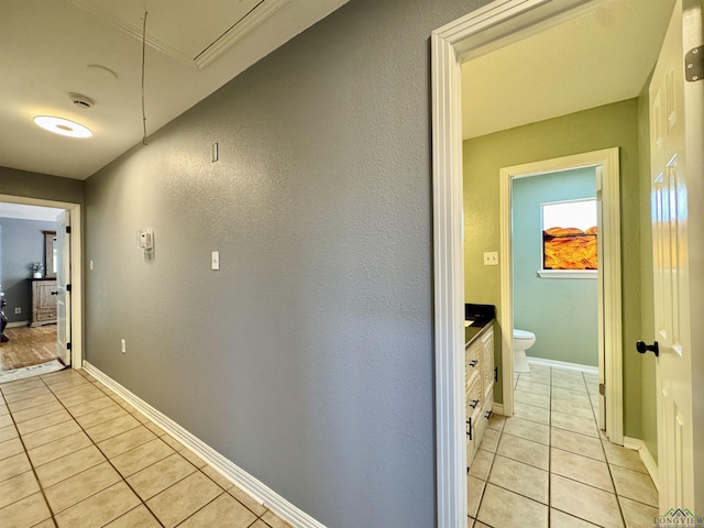 hallway with light tile patterned flooring