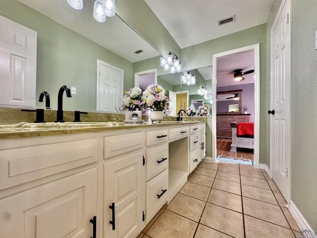 bathroom featuring vanity, tile patterned floors, and ceiling fan