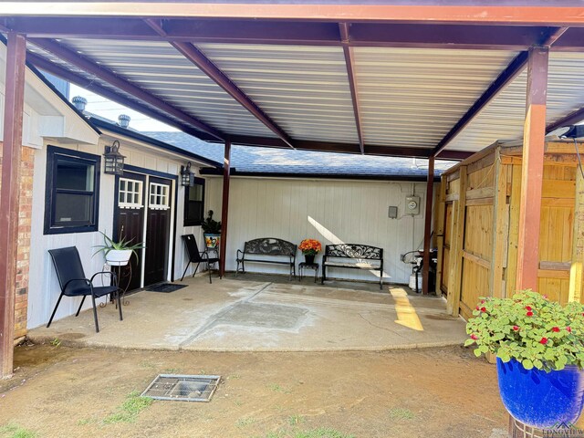 100 Bretta Cir, Longview, TX 75605 - property entrance featuring roof with shingles