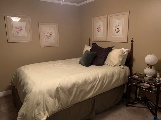 carpeted bedroom with crown molding