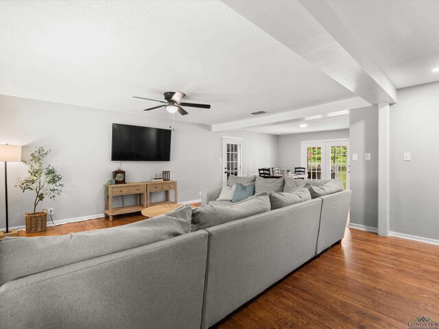 514 N St, Gilmer, TX 75644 - living area with wood finished floors, a ceiling fan, recessed lighting, and french doors