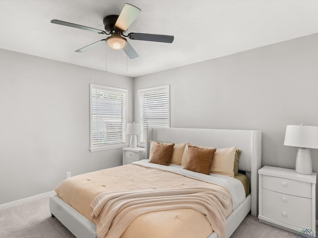 514 N St, Gilmer, TX 75644 - bedroom with light colored carpet and a ceiling fan